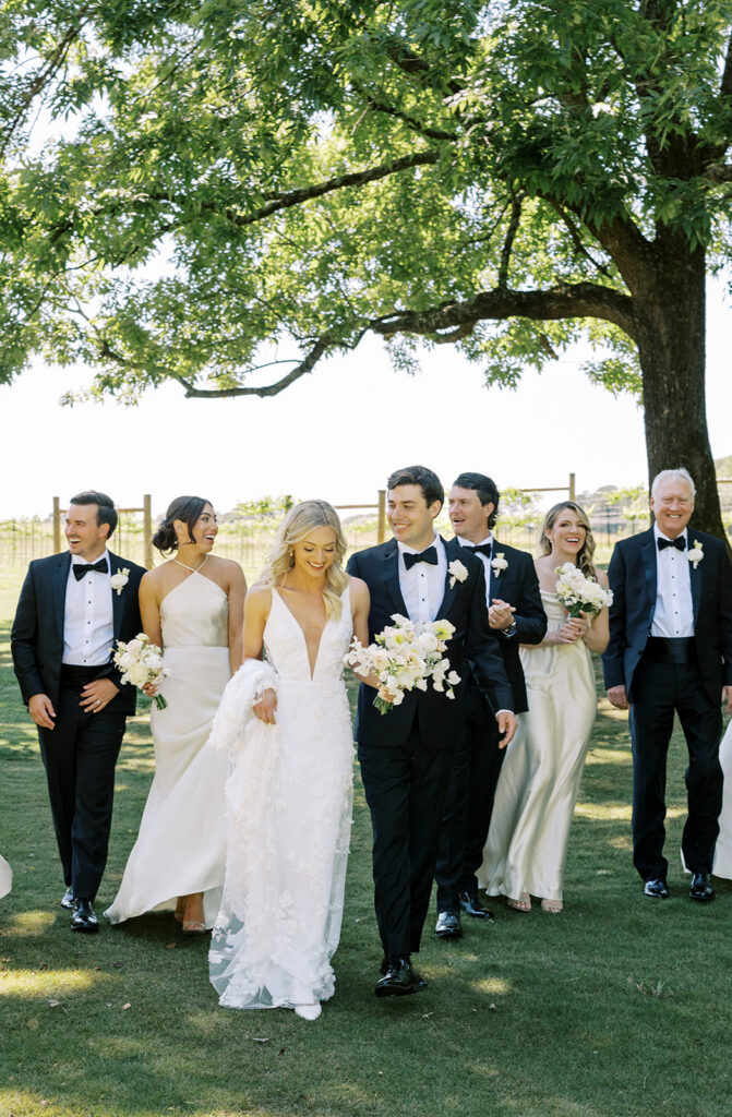 Bride and groom with bridal party after the wedding ceremony at an outdoor wedding venue near Atlanta