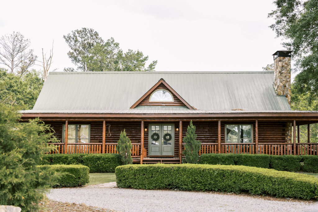 A log cabin offers on-site accommodations at The Venue at Murphy Lane located near Atlanta