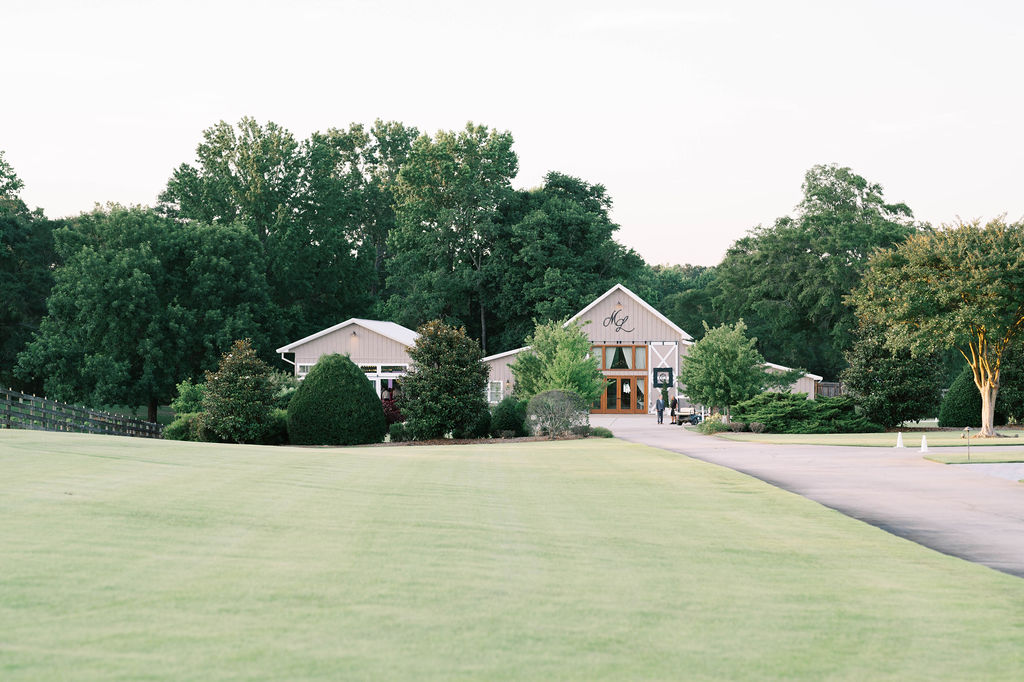 The Venue at Murphy Lane is an 88 acre estate with lush manicured green lawns, large magnolia, maple and oak trees and a 3 acre vineyard located in Newnan, GA just one hour away from Atlanta, GA