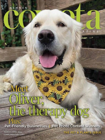 The cover of a Newnan-Coweta Magazine showing a therapy dog.